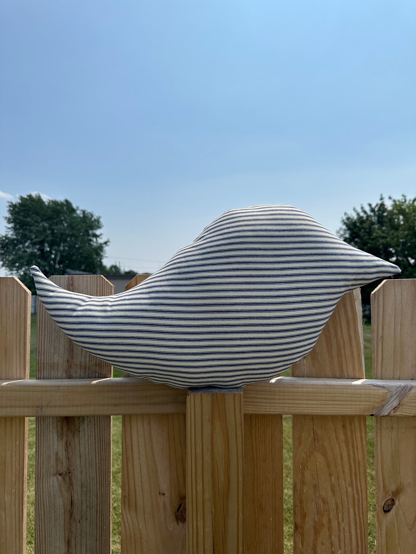 pillow shaped like a bird