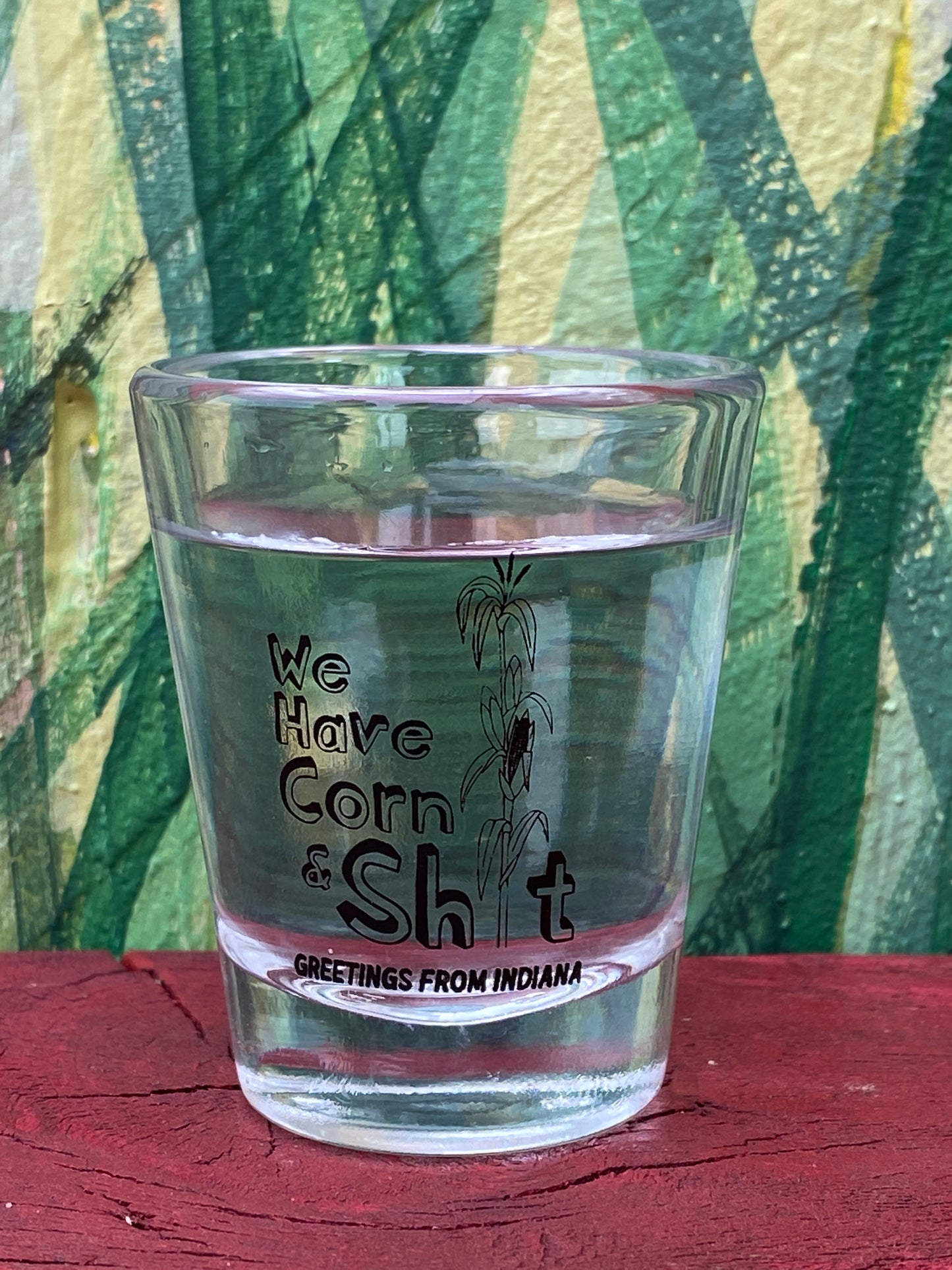 shot glass we have corn and shit