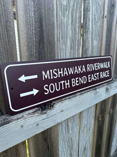 mishawaka riverwalk south bend east race sign